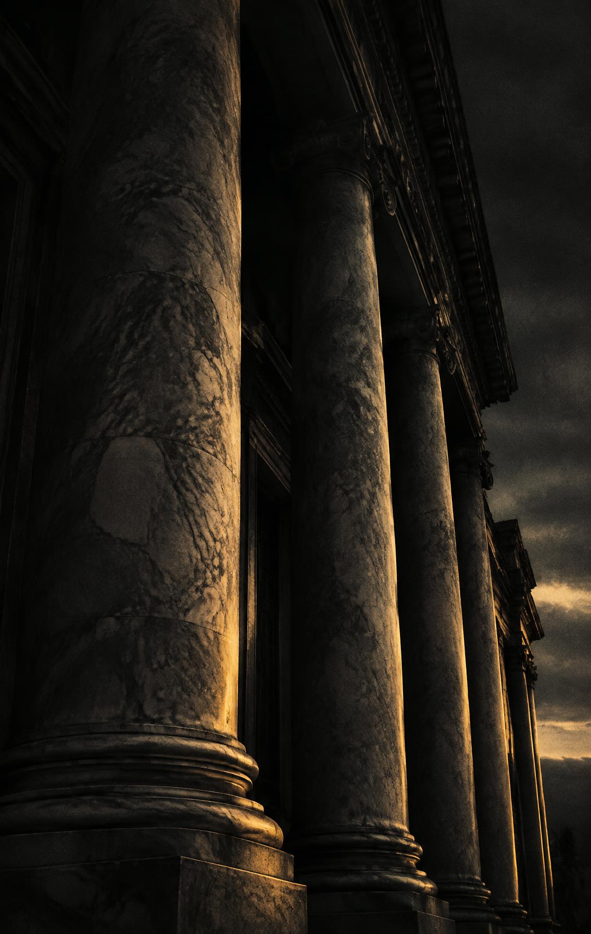 Monumental stone columns at twilight